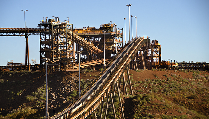 Ore handling plant which crushes and mixes the iron ore until the correct blend is produced, the iron ore is then moved by conveyor belts to storage facilities prior to transport